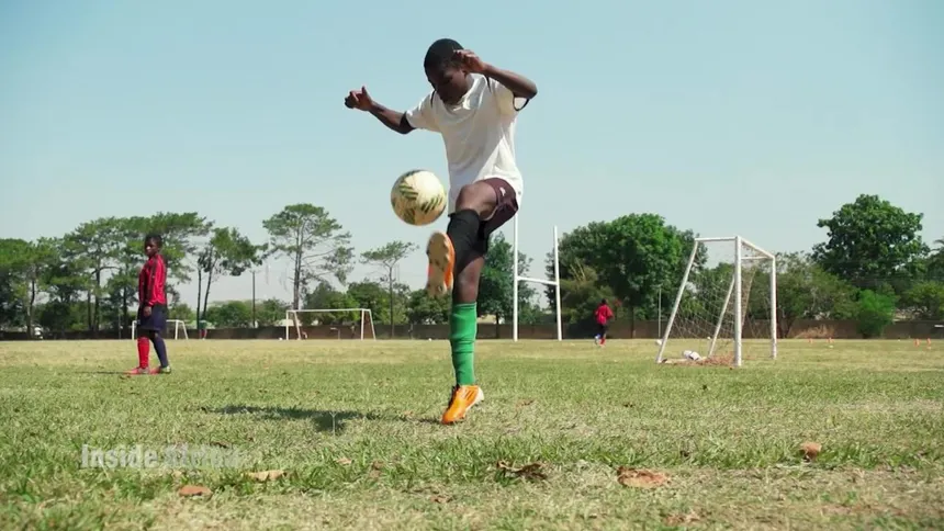 Boy playing football
